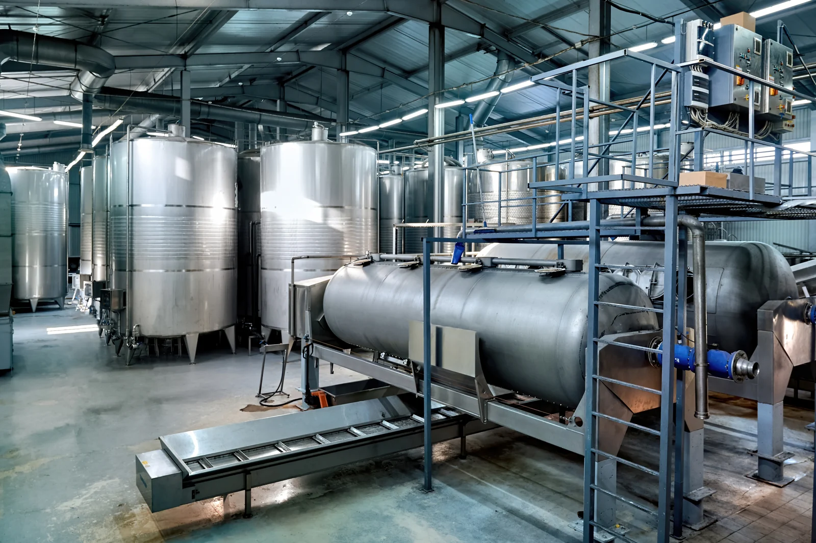 The Tea Planet manufacturing facility — stainless-steel processing tanks