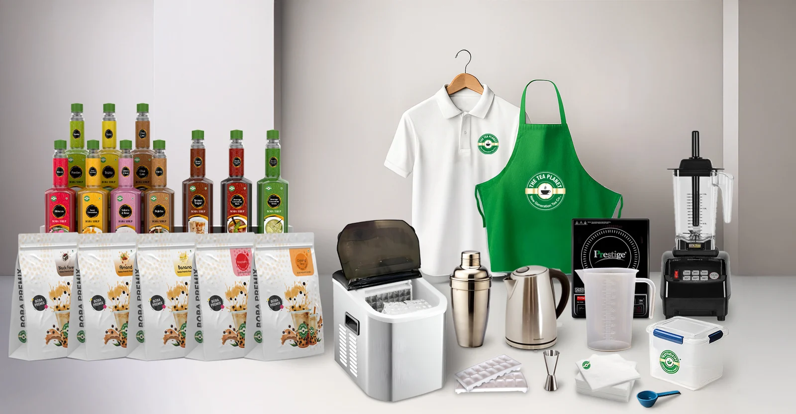The Tea Planet Boba Business Package — boba syrups, premix pouches, ice maker, blender, shaker, kettle, induction, measuring jug, branded apron and uniform